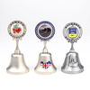 Custom Engraved Logo Metal Country Souvenir Gift Table Rotate Spinning Hand Dinner Bell